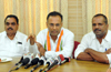 Karnataka KPCC pats backs of CM, Minister George